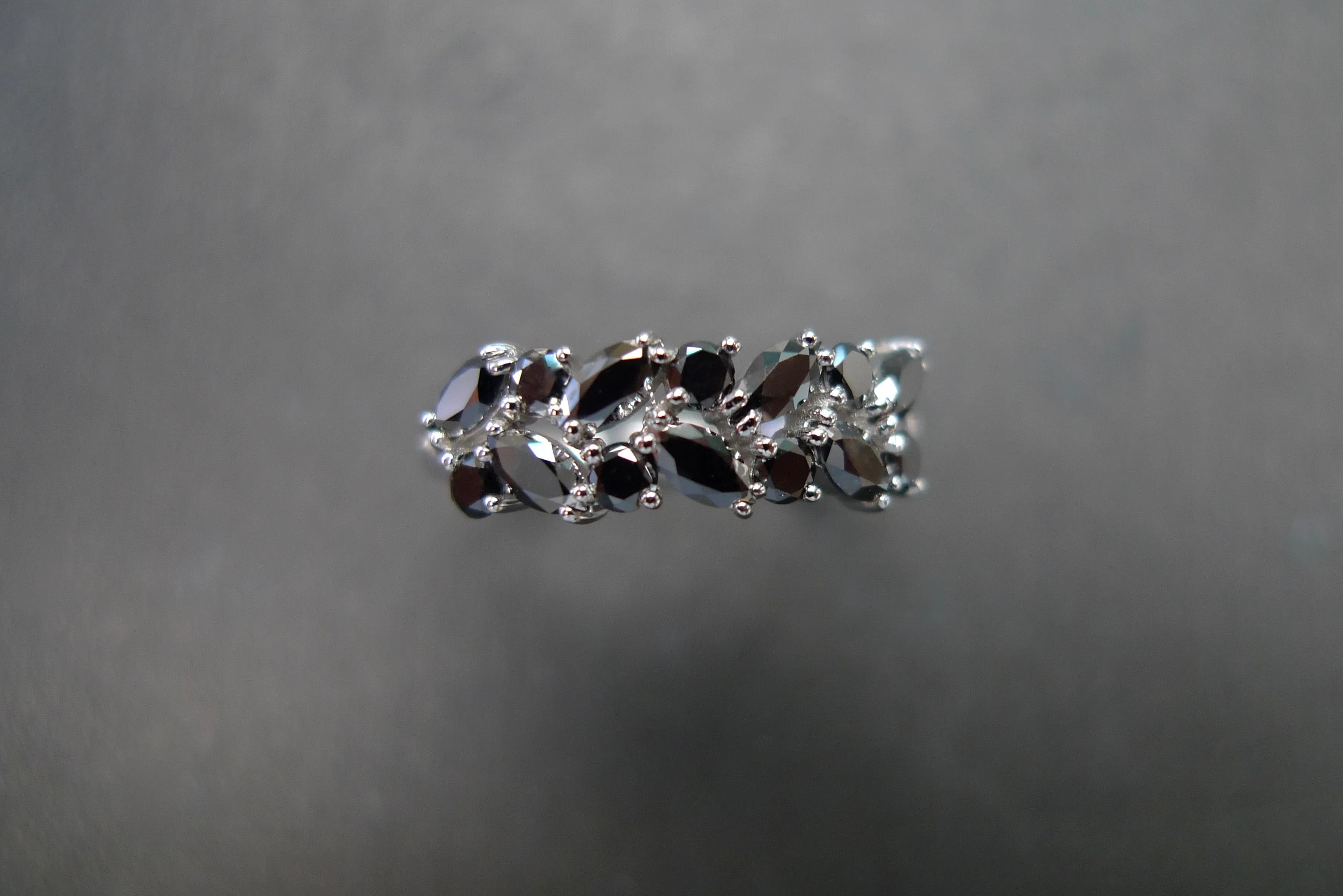 Marquise Cut and Round Cut Black Diamond Ring in White Gold