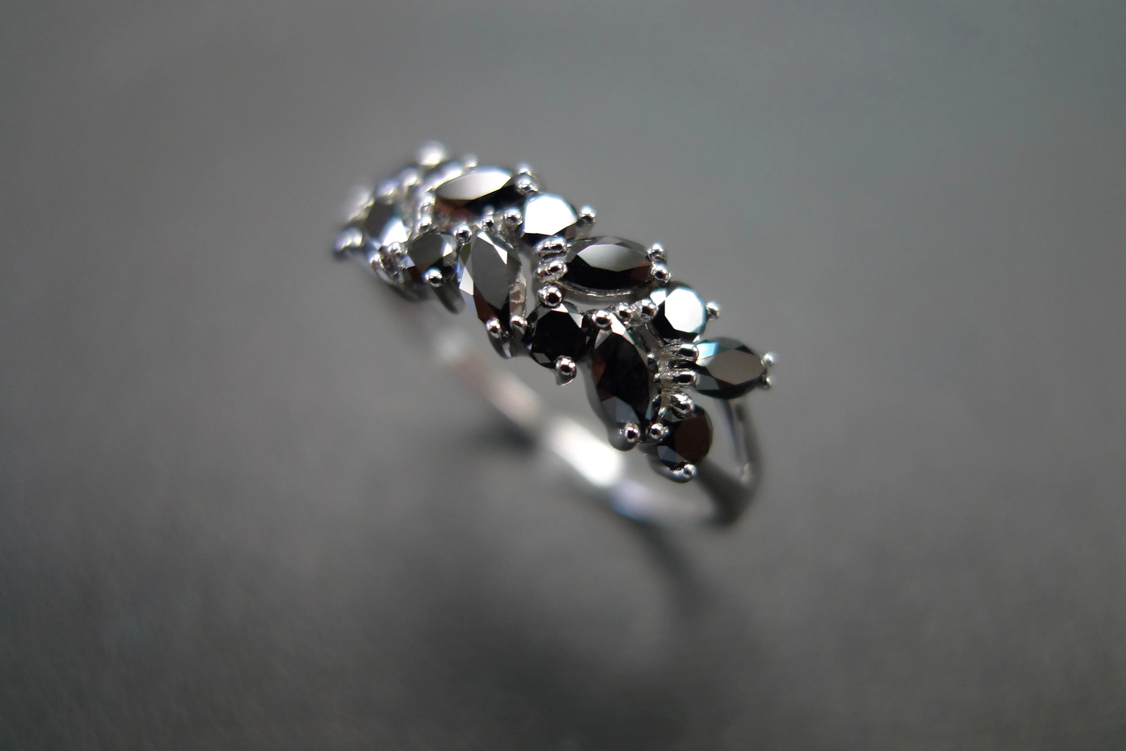 Marquise Cut and Round Cut Black Diamond Ring in White Gold