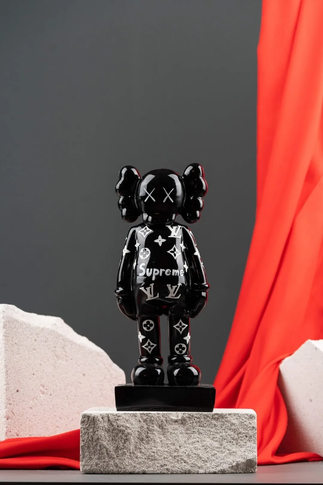 Supreme Shadow: The Black Supreme KAWS Figure