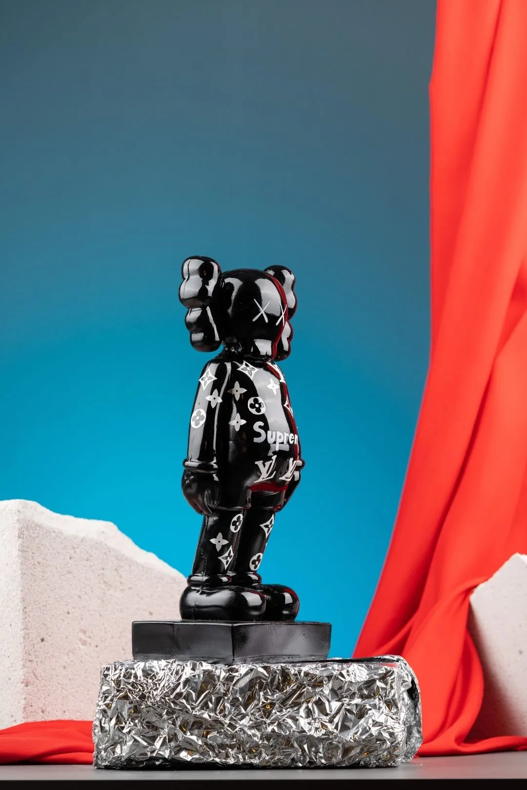 Supreme Shadow: The Black Supreme KAWS Figure