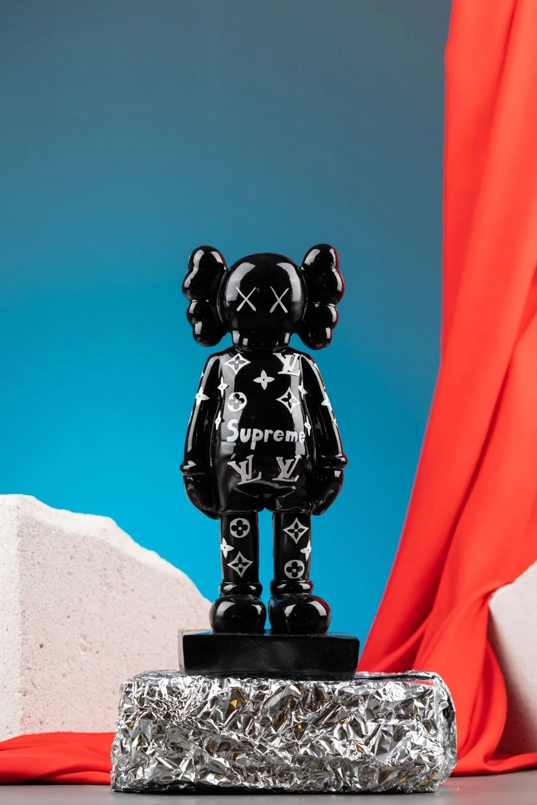 Supreme Shadow: The Black Supreme KAWS Figure